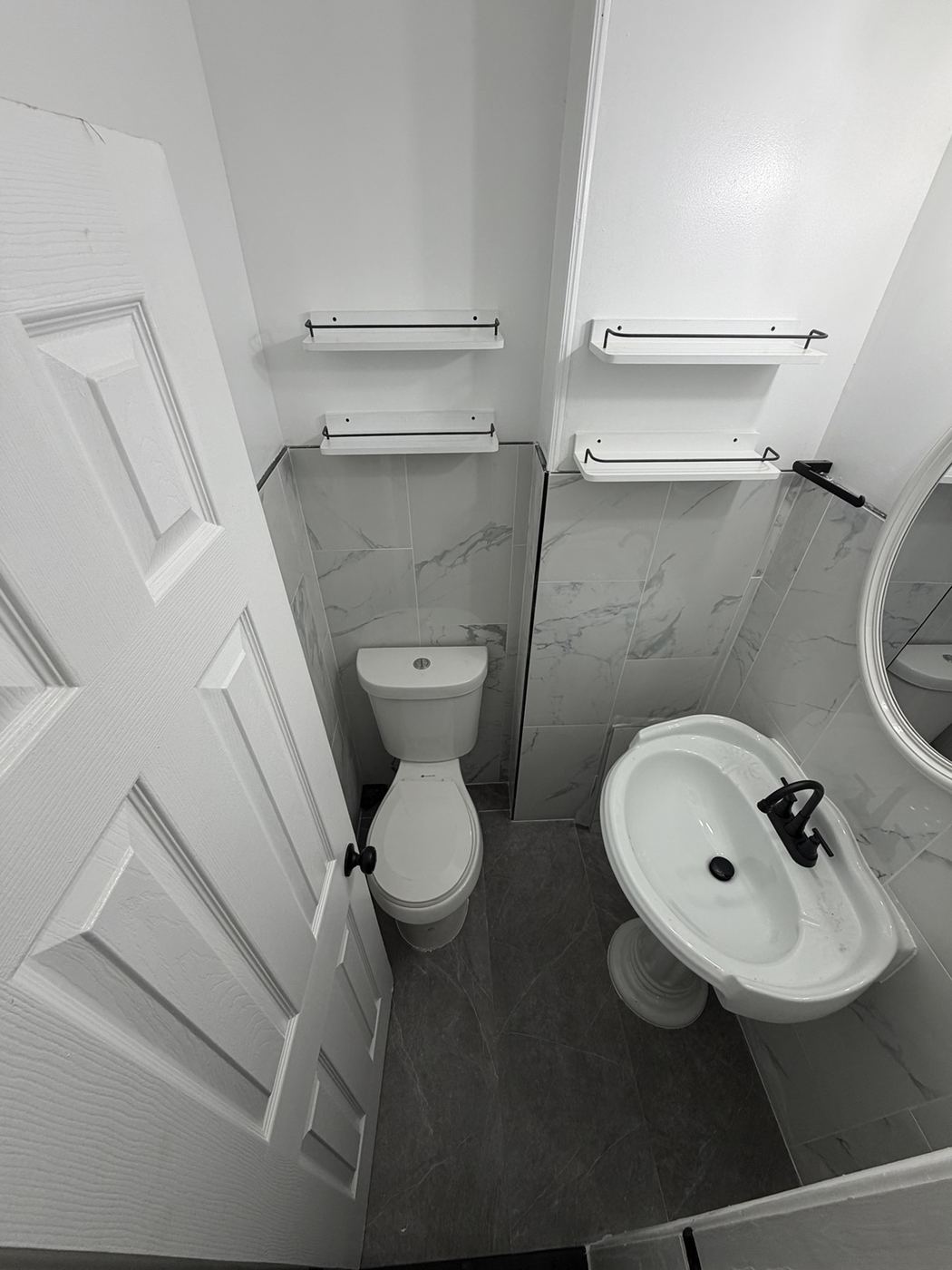 Bathroom after remodeling with tile and updated fixtures